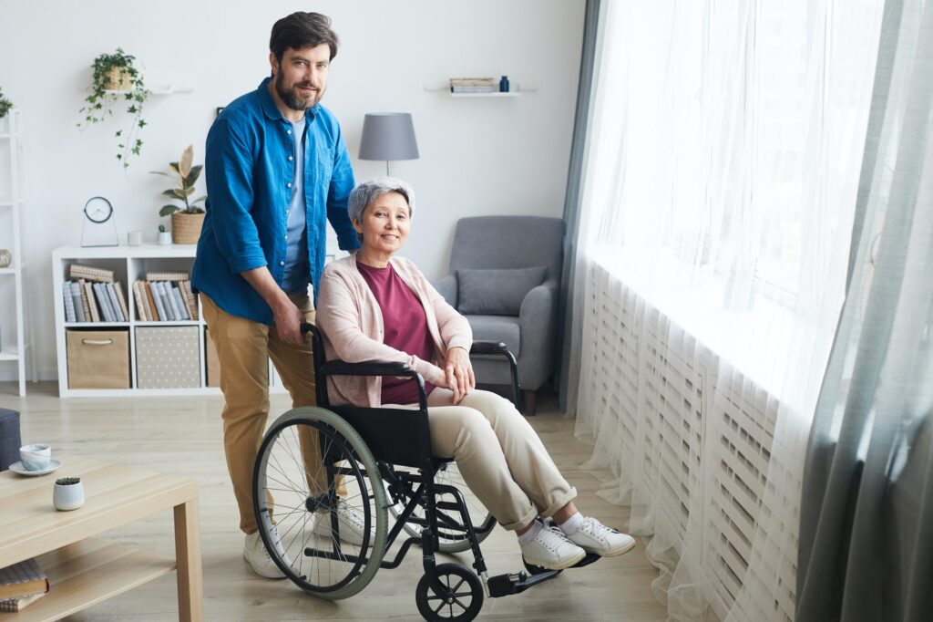 Disabled woman with caregiver