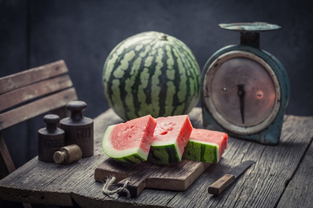 Delicious watermelon on an old wooden table